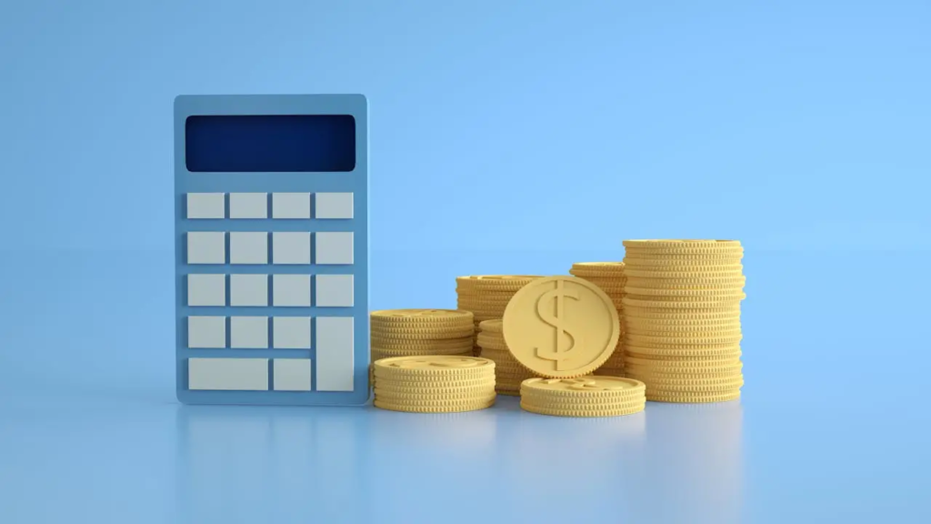 Calculadora e pilha de moedas de ouro