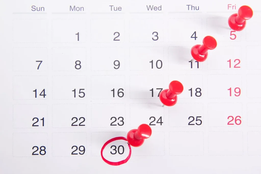 Calendário com data 30 marcada em vermelho